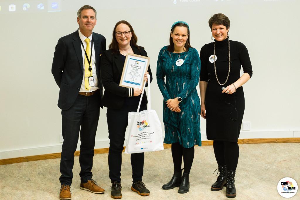 Prize ceremony at the closing event. From the left: Dean Adam Smale, Vaasa University, Tiina Partanen, Foamit Group – Jenny Peräsarka, SupercoHR/Foamit Group - Aušrinė Šilenskytė, Ph.D. Erasmus+ DEI4SME Project leader, Vaasa University.